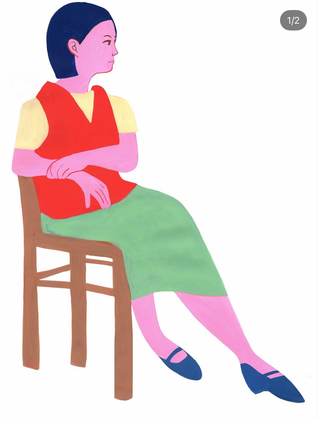 A colourful figure in a red dress seated on a wooden chair